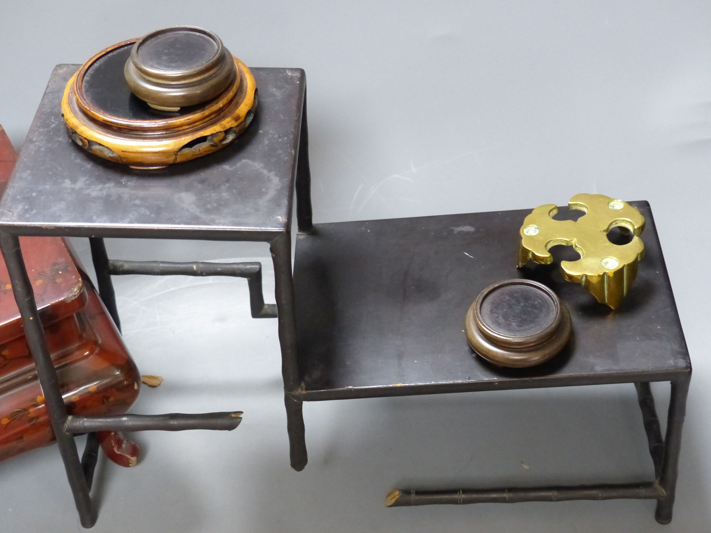 A group of Chinese wooden and bronze stands, tallest 15cm